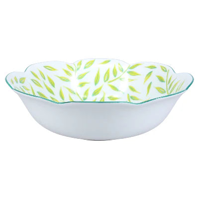 Olivier soup and cereal bowl in spring design, featuring green leaf patterns on a white background with a scalloped edge.