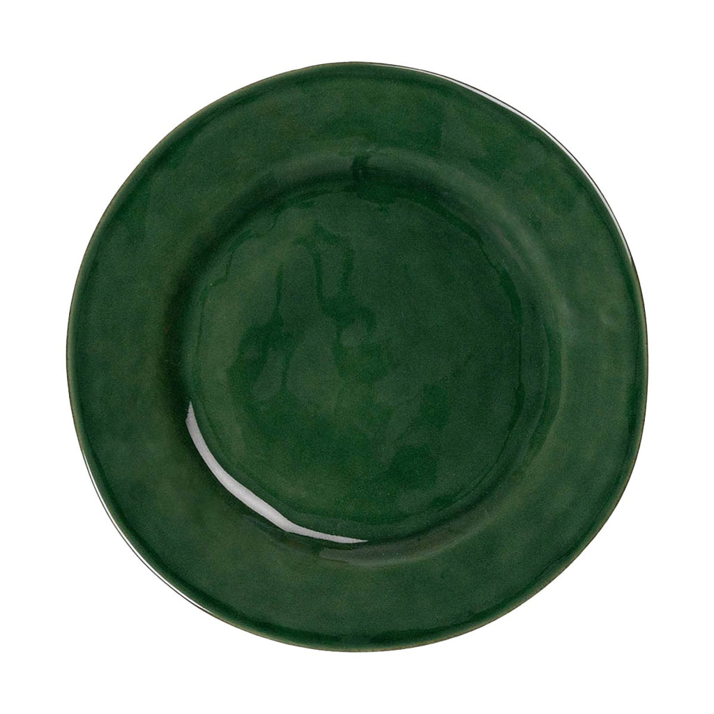Puro dinner plate in basil green with a glossy finish and a smooth, round shape.