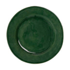 Puro dinner plate in basil green with a glossy finish and a smooth, round shape.
