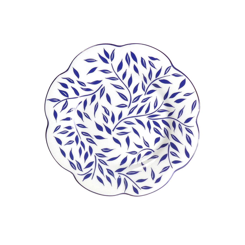 Olivier dessert plate in blue featuring a leaf pattern on a white background with a scalloped edge.