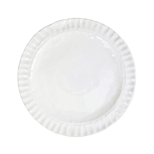 Pietra Serena dinner plate in white with a ribbed edge, featuring a glossy finish and round shape.