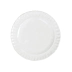 Pietra Serena salad plate in white ceramic with a textured, fluted edge, viewed from above.