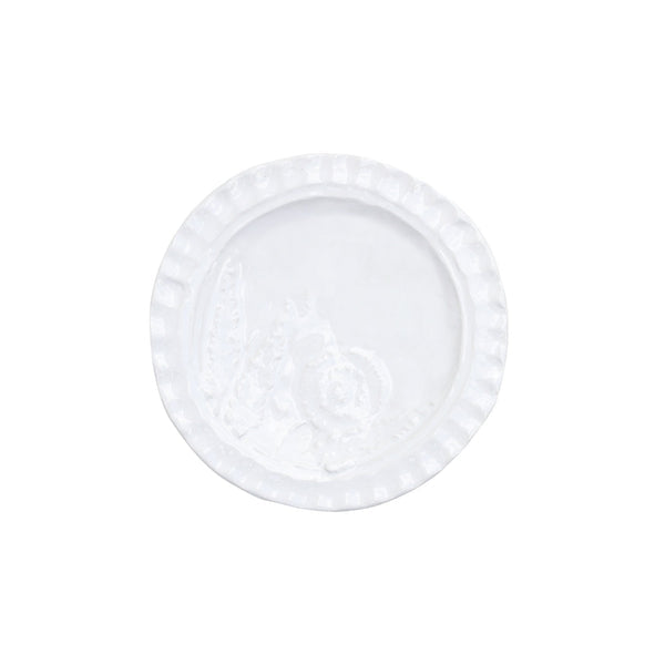 Pietra Fiori white canape plate with a textured rim and floral design in the center.
