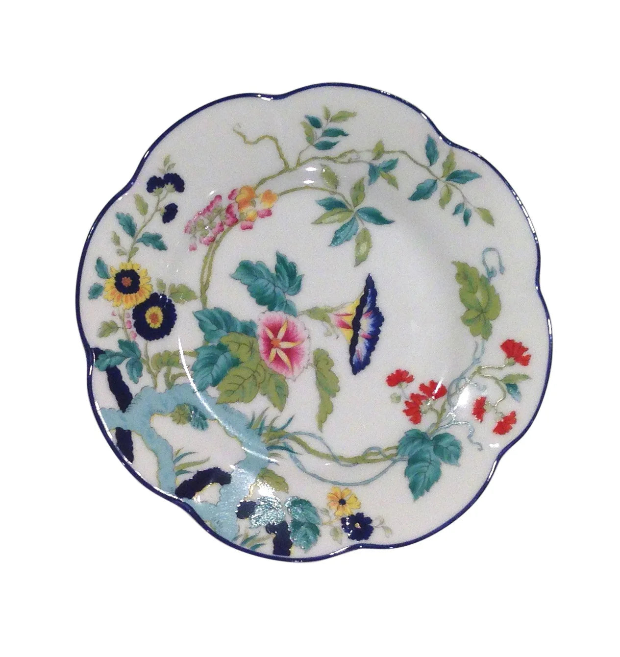 Paradis Bleu bread and butter plate featuring a floral design with colorful flowers and a scalloped edge.
