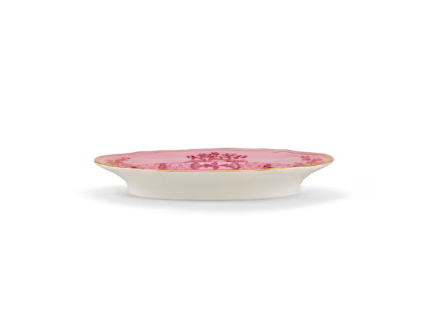 Oriente Italiano pickle dish in pink with floral design and gold trim, featuring a scalloped edge.