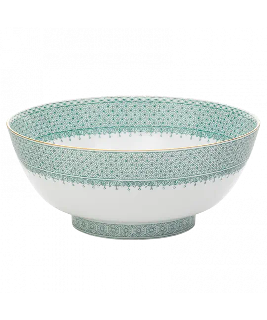 Green lace round serving bowl with intricate turquoise and white patterns and a gold rim, displayed at an angle.