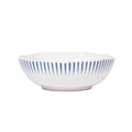 Sitio stripe coupe bowl in Delft blue with white base and blue vertical stripes, showcasing a scalloped edge.